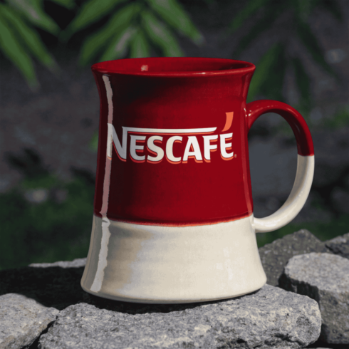 Iconic Wrap Design: Nescafé Coffee Mug Pair Mockup Set” cover image.