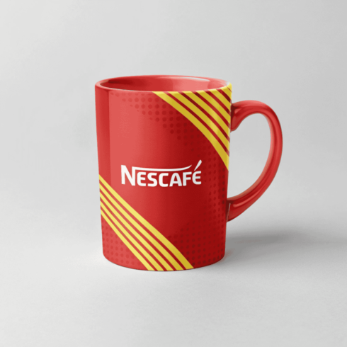 Vibrant Red & Yellow Nescafé Logo Mug Mockup Duo cover image.