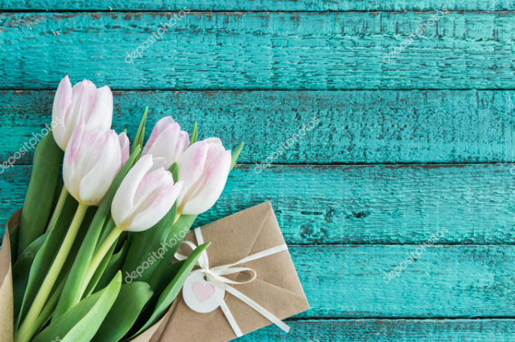 White tulips on a blue background with the letter.