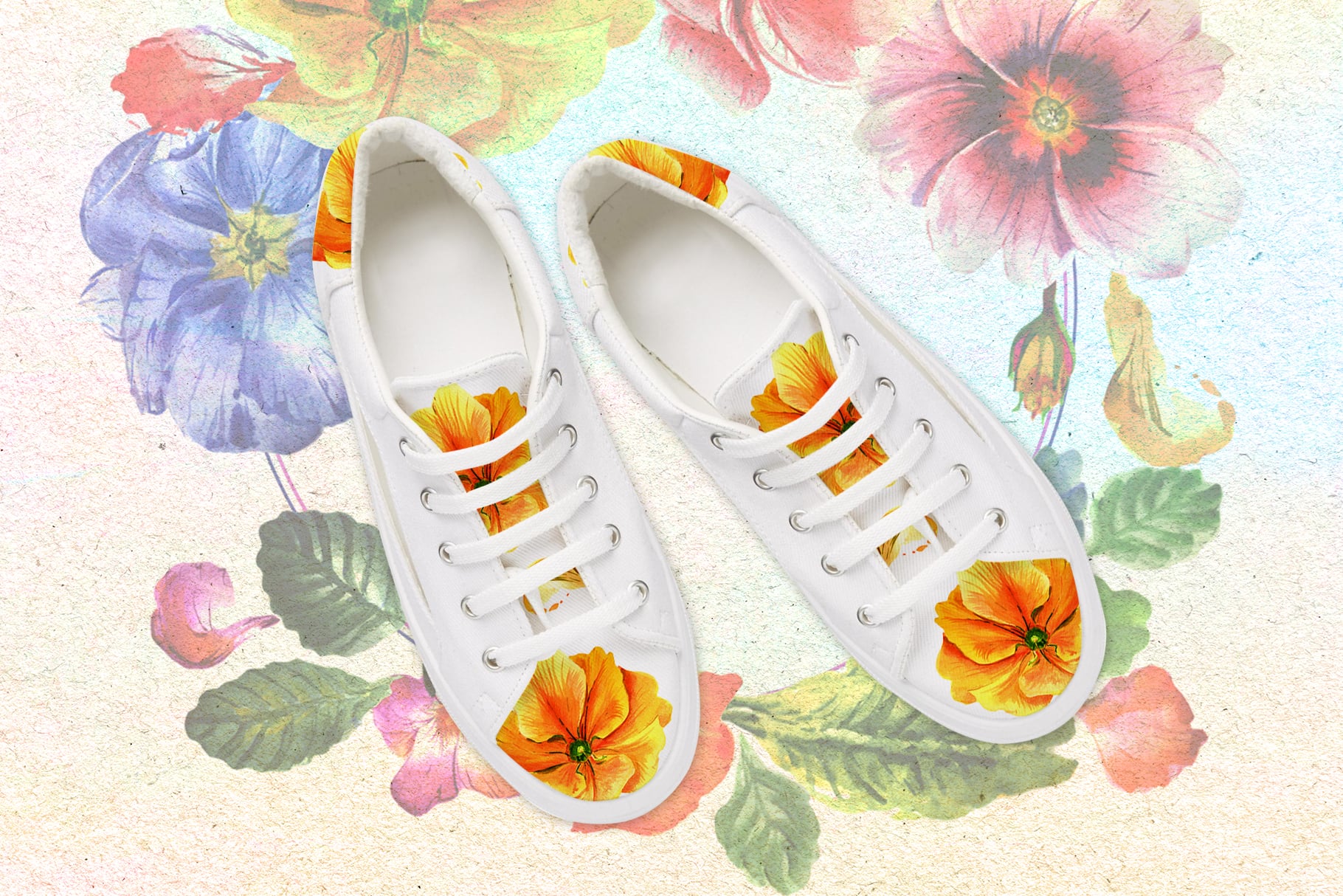 White shoes with yellow flowers.