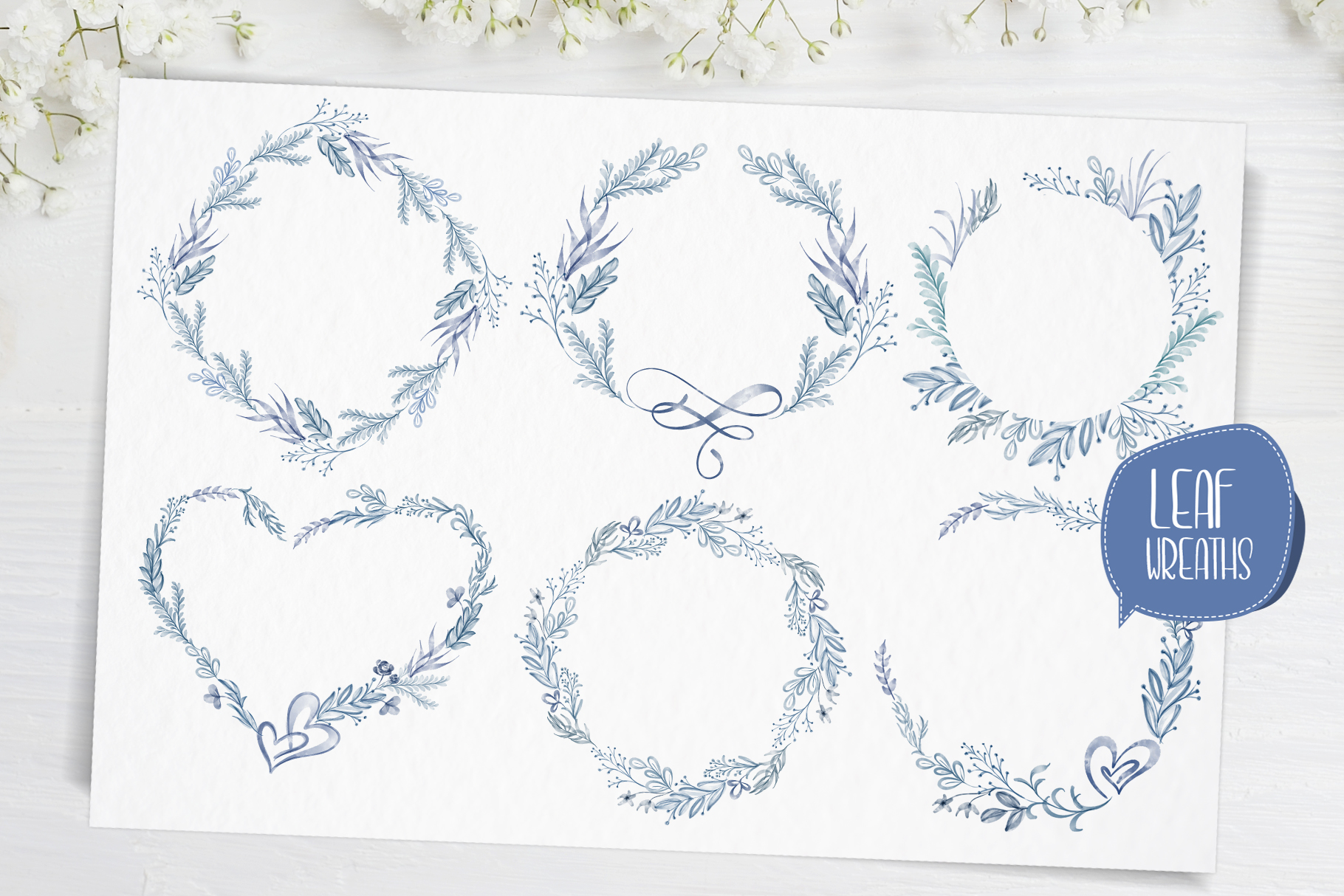 Watercolor blue leaf frames in different shapes.