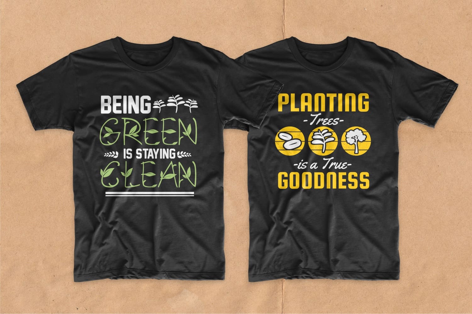 Two black T-shirts with green and yellow lettering.
