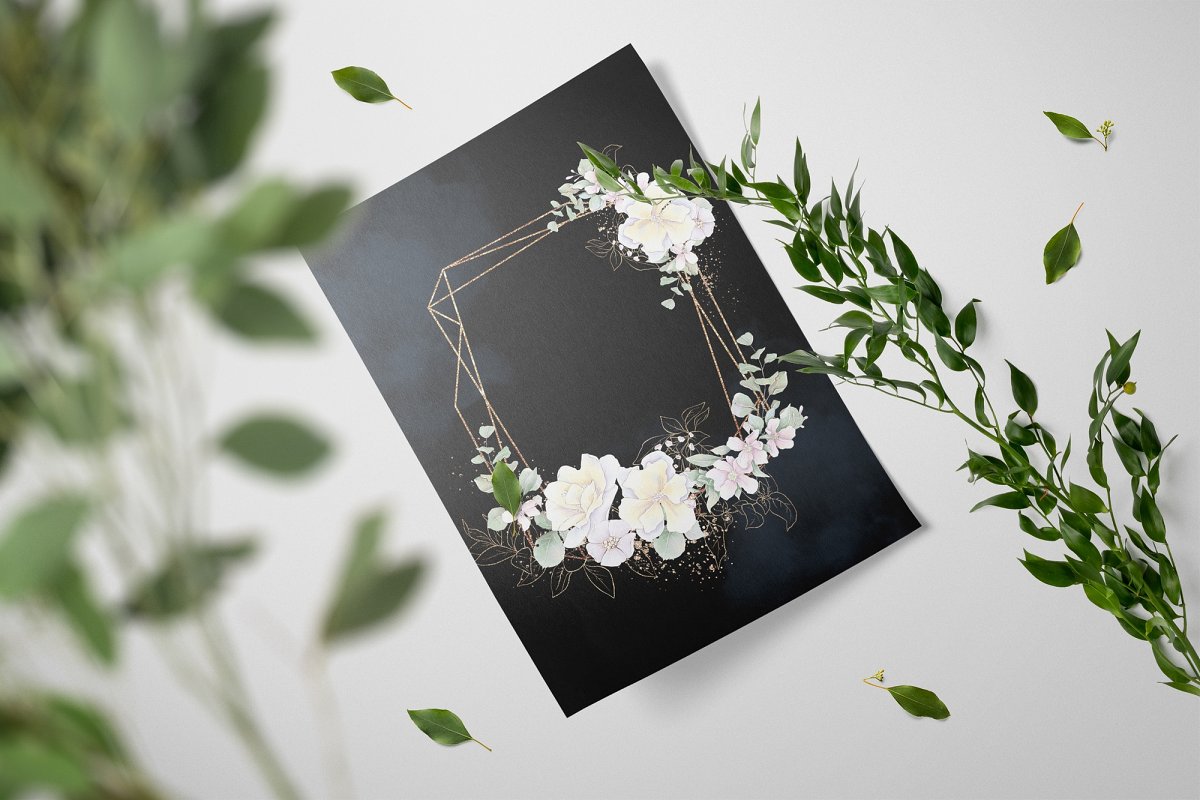 Matte black paper with a light frame and delicate flowers.
