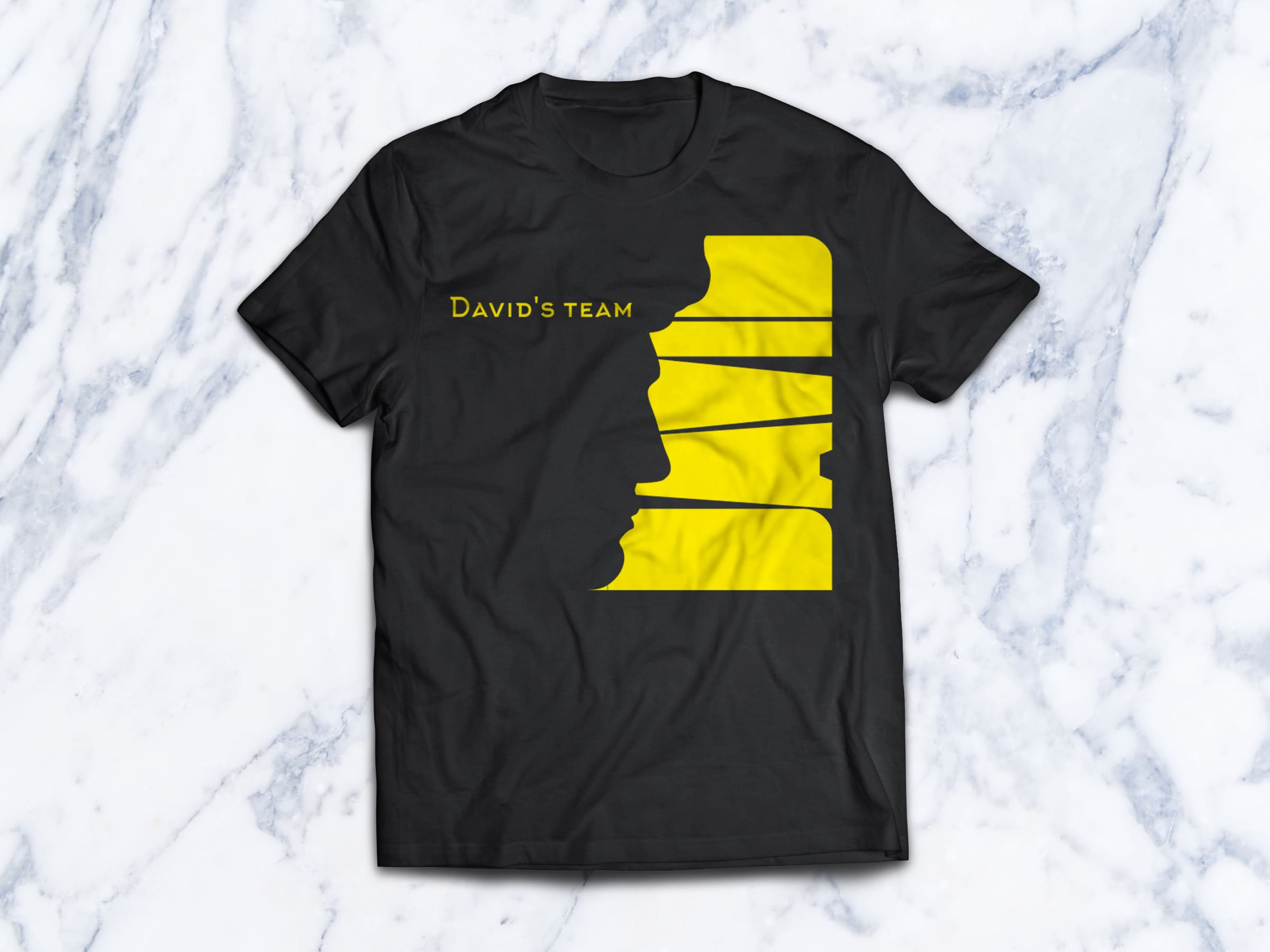 T-shirt in black color with yellow font and graphic.