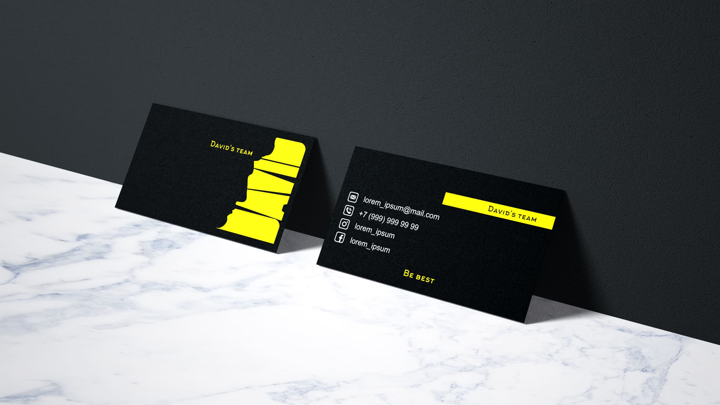 Black matted card with yellow elements.