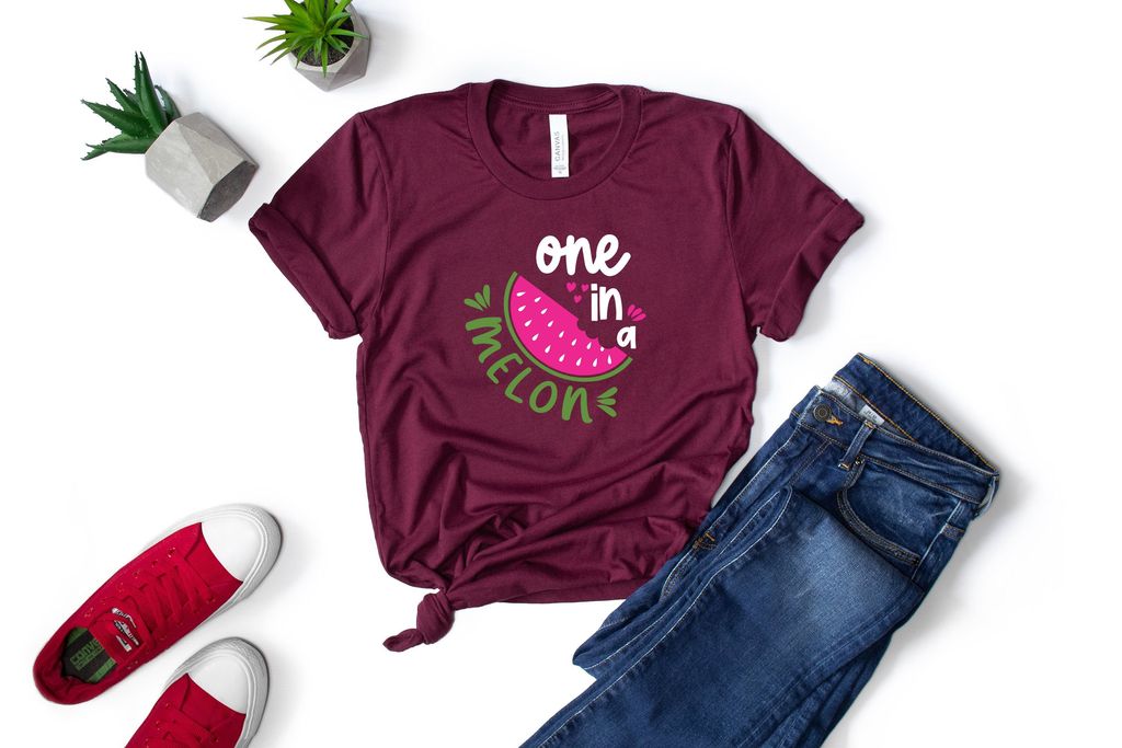 Jeans and burgundy T-shirt with watermelon.