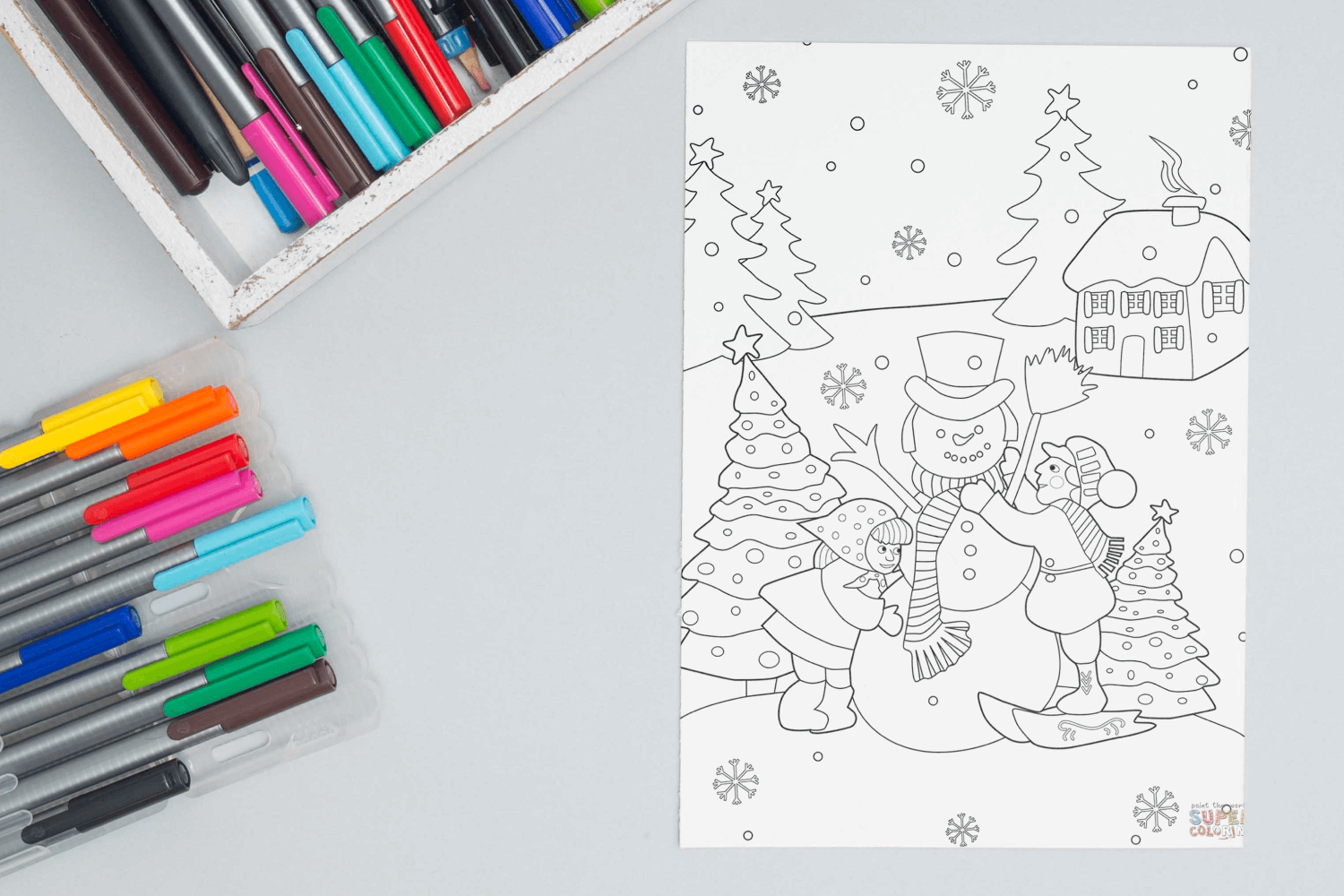 Boy and Girl Building a Snowman coloring page facebook image.