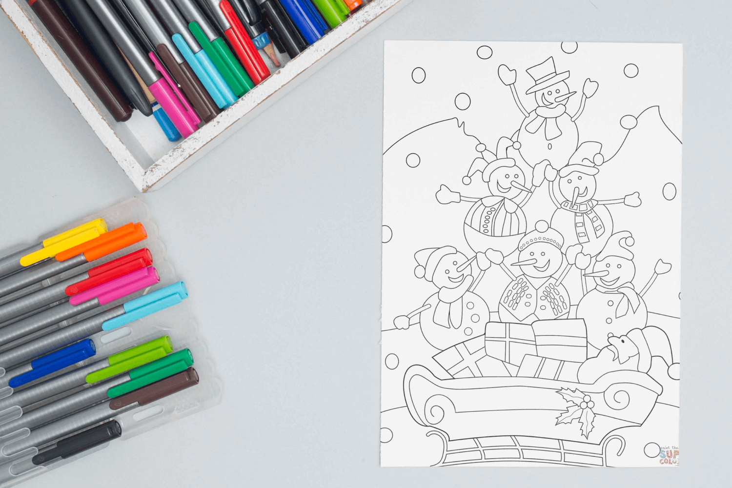 Snowmen with Santa on a Sled coloring page facebook image.