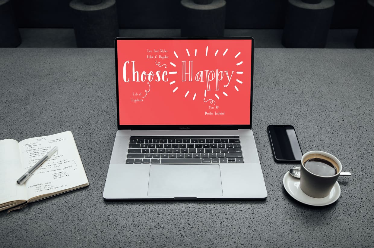 Margalo - A Cheerful Serif Font -"Choose Happy" On The Laptop .