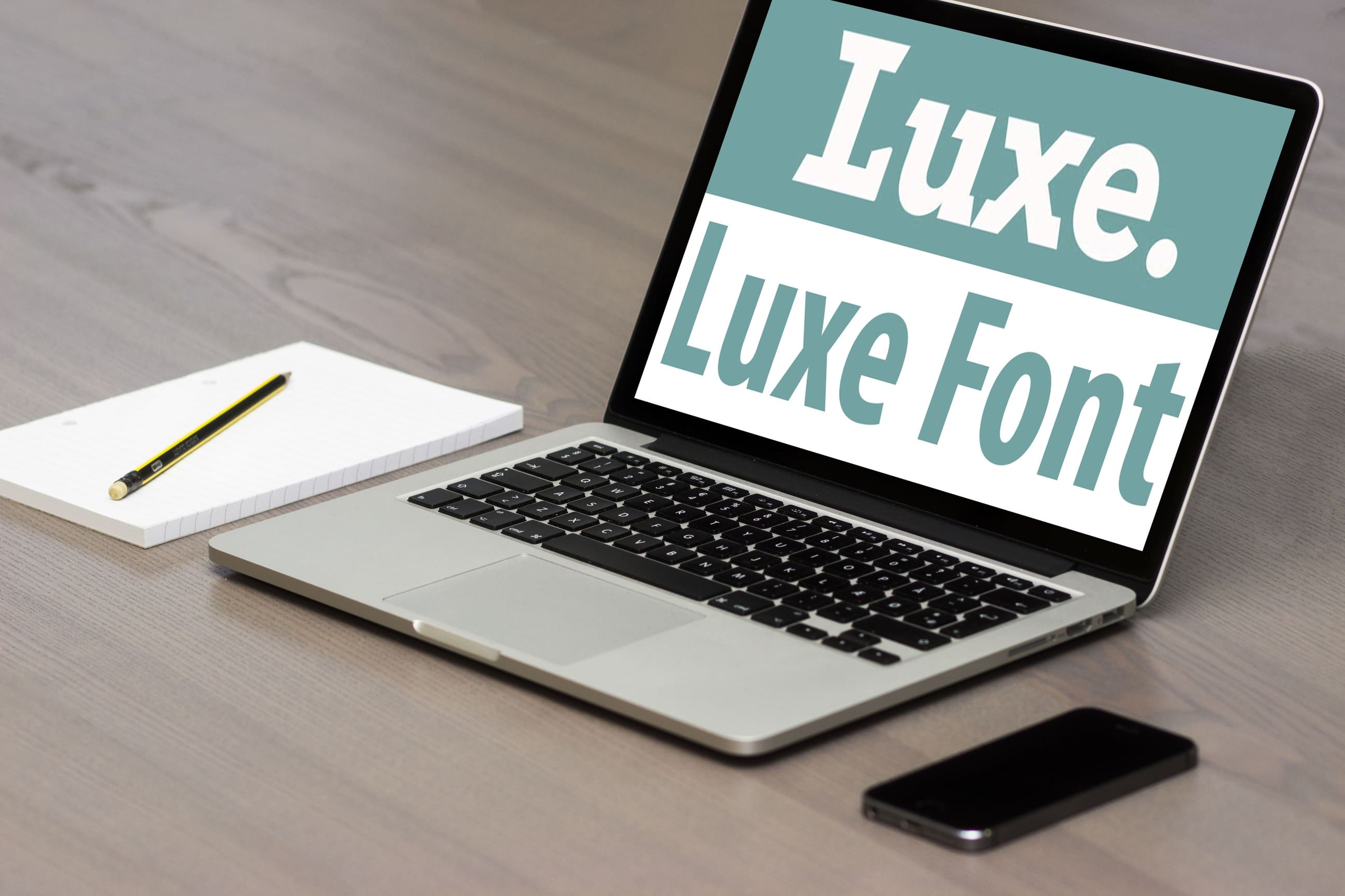 Luxe - Luxe Font On The Laptop.