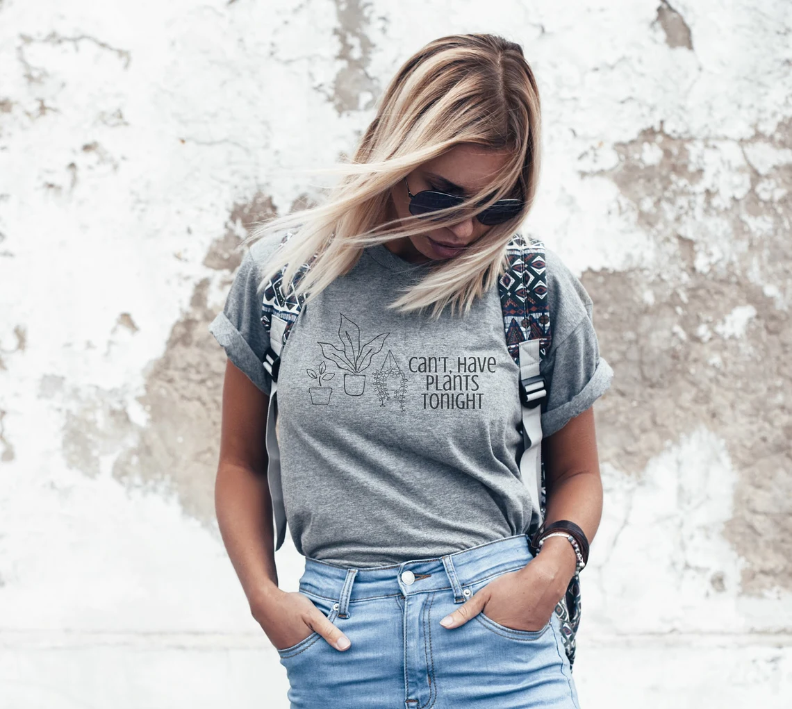 Girl in a gray T-shirt and jeans.