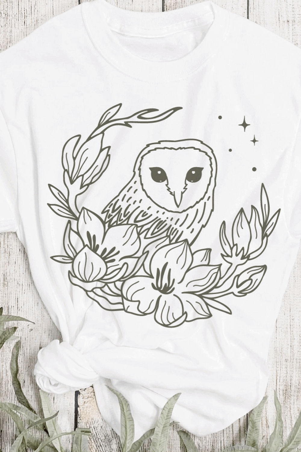 Boho Owl with Flowers SVG on the T-shirt.