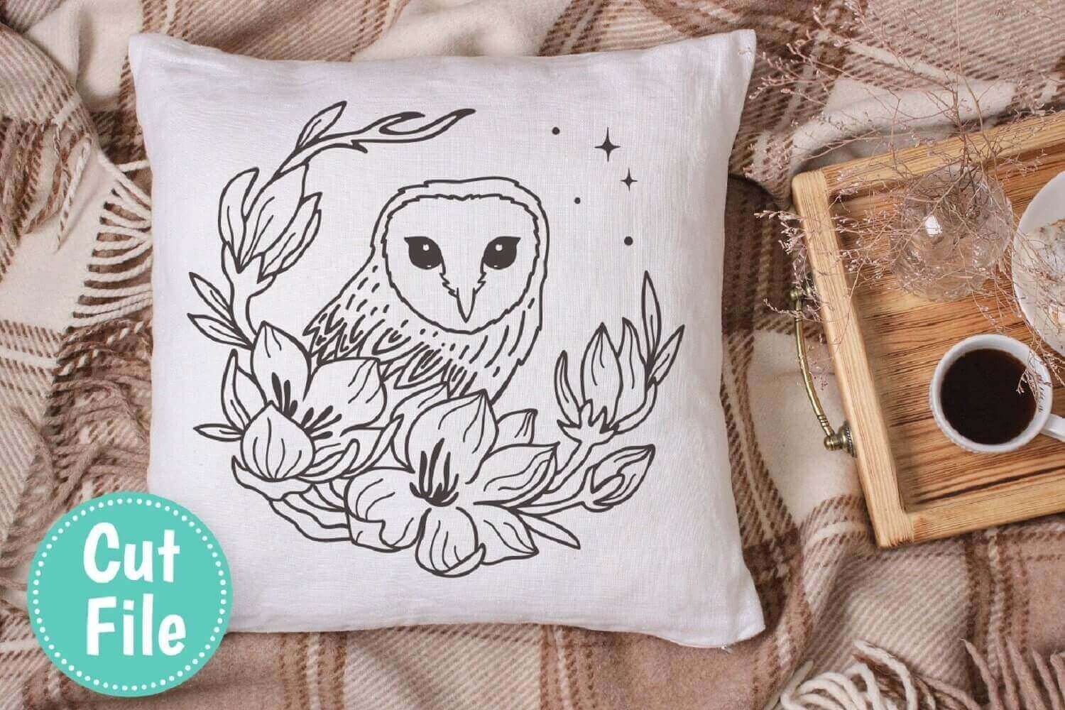 Boho Owl with Flowers SVG on the White Pillow.