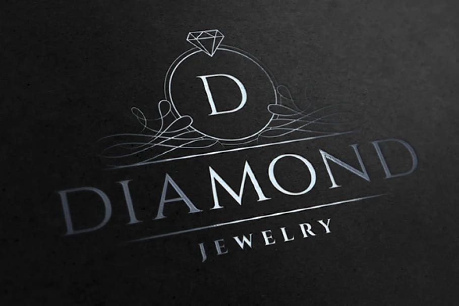 diamond jewel logo on dark background.