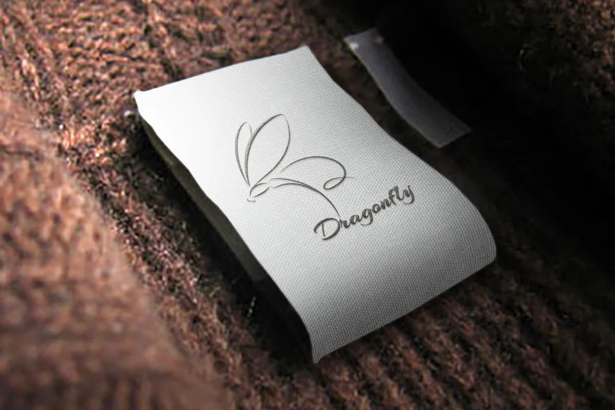 dragonfly logo delicate lines in design.
