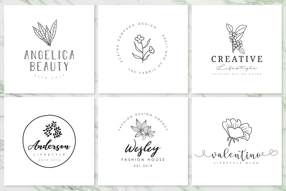 hand drawn feminine logo with flowers art.