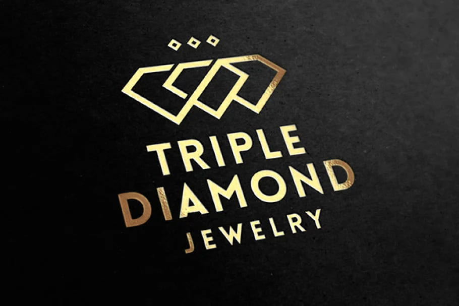 tribple diamond jewelry golden logo on dark background.