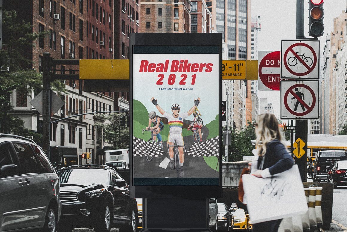 A poster on the street with the image of cyclists and the inscription "Real bikers 2021".