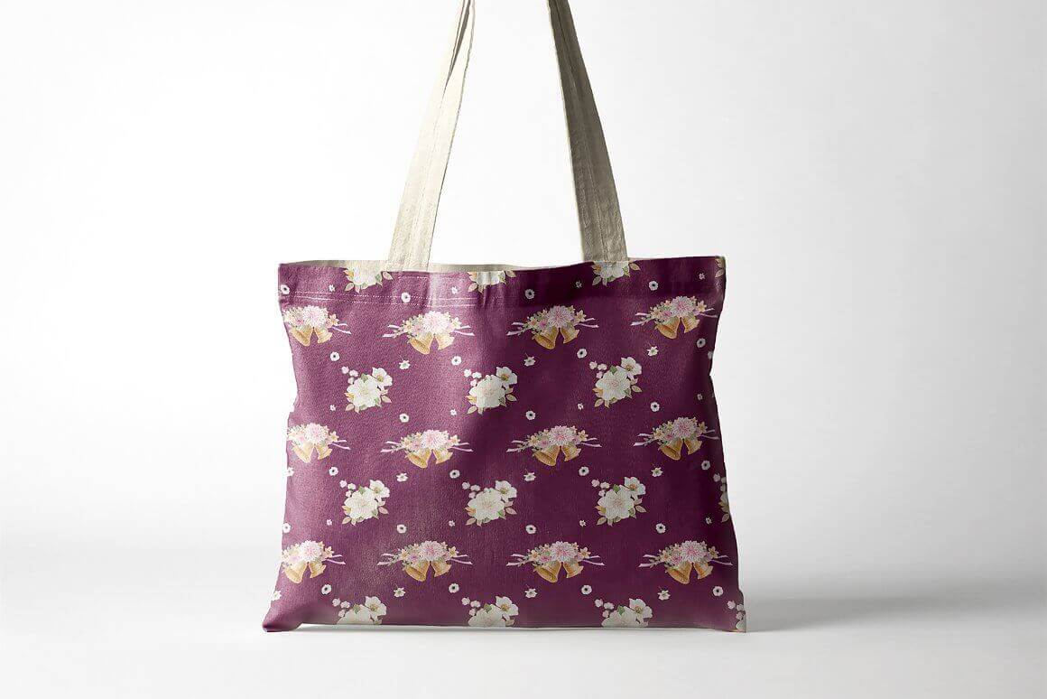 Fabric purple bag with flowers and bells.