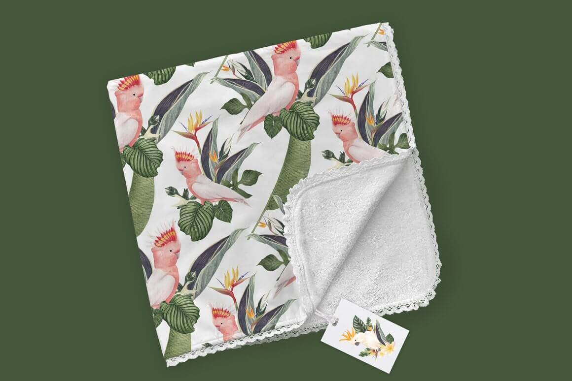 Napkin with a tropical design on a dark green background.