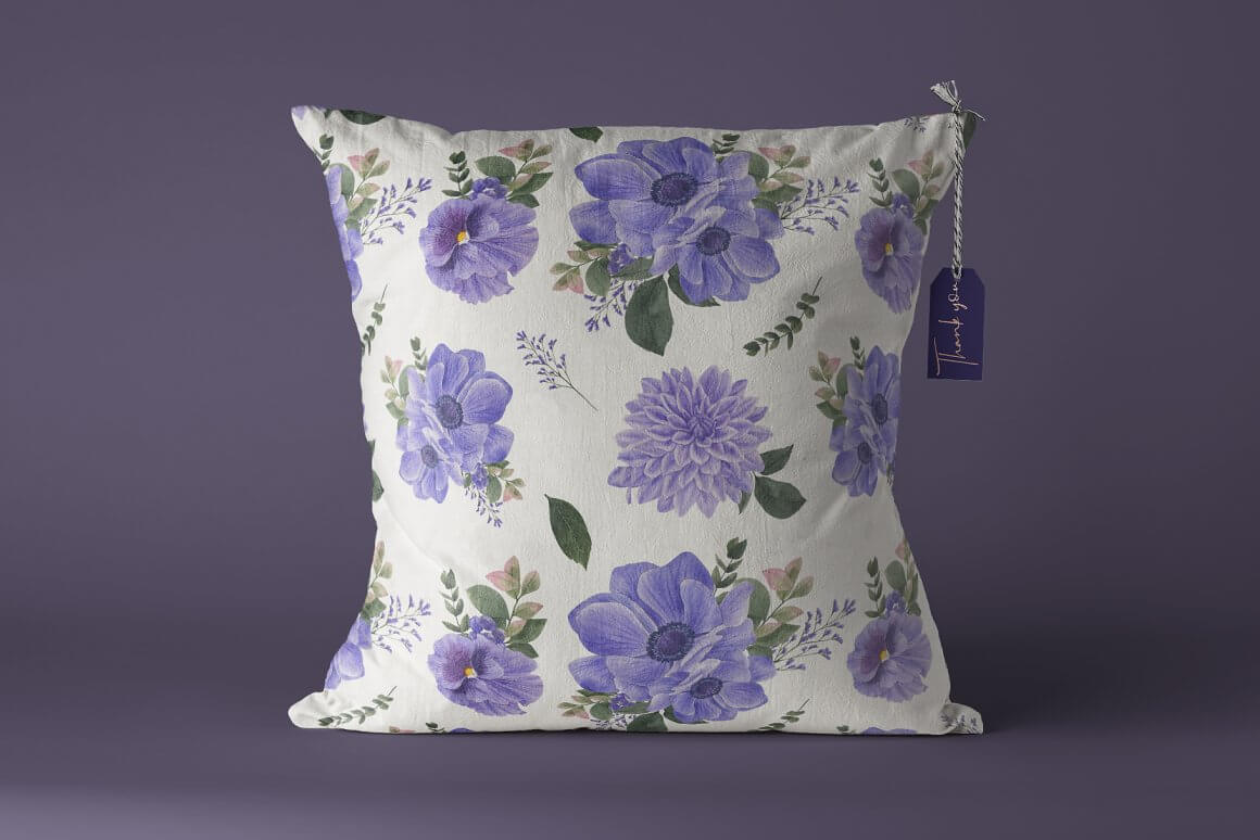 Cushion cover with purple flowers.