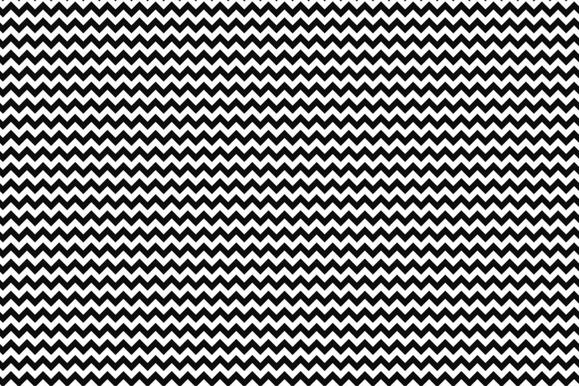 Texture of identical black and white zigzag tops.