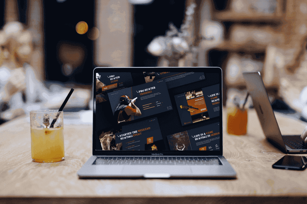 Hunter Hunting - Powerpoint Template On The Laptop With A Cocktail.