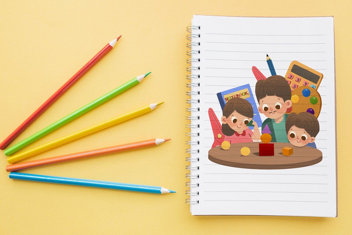 A notebook with the image of students, a teacher and school supplies, and next to the notebook are multi-colored pencils.