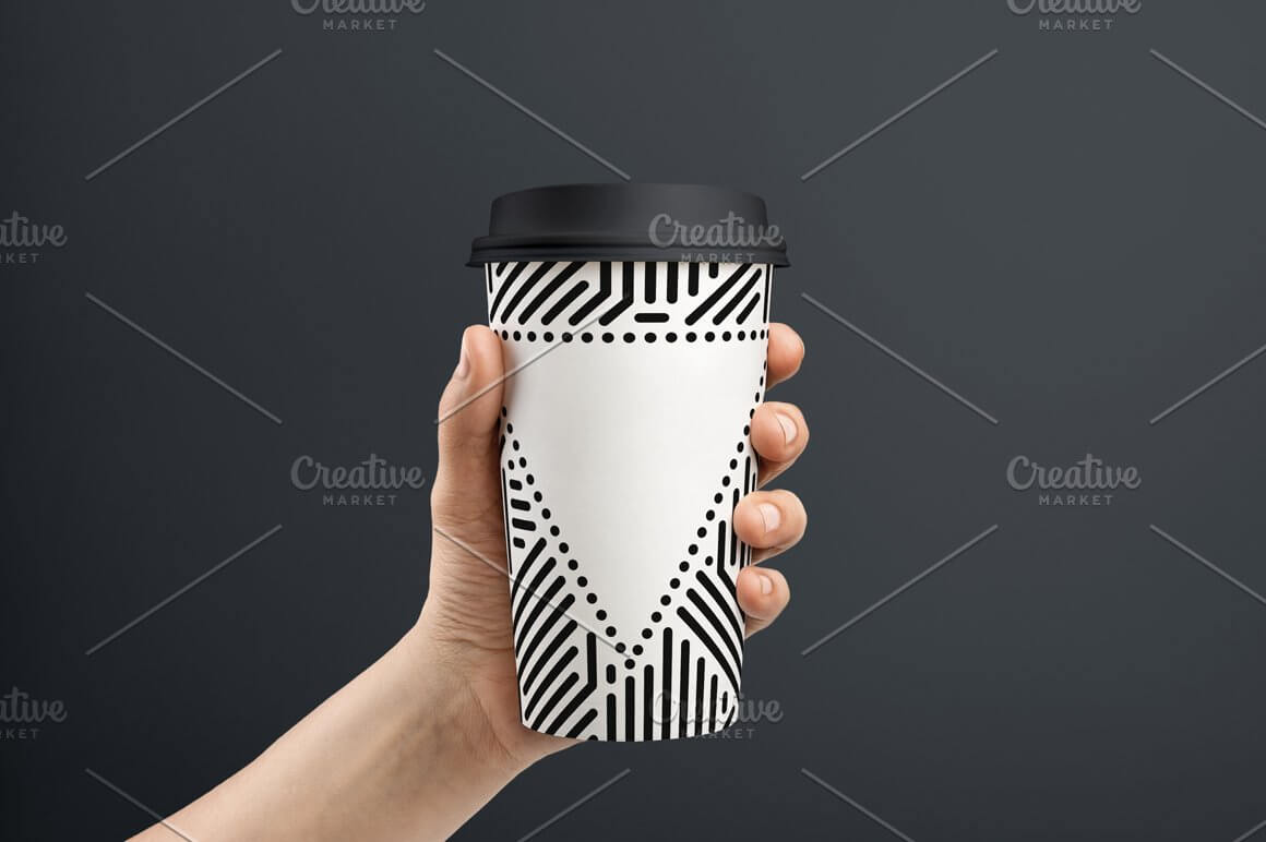 Triangle dotted on a disposable cup with lid.