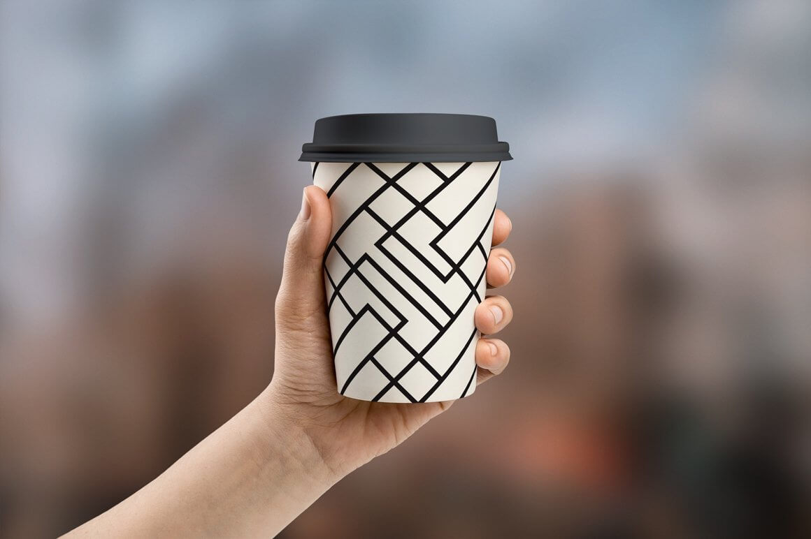 Samples of geometric seamless patterns on a disposable cup with a plastic lid.