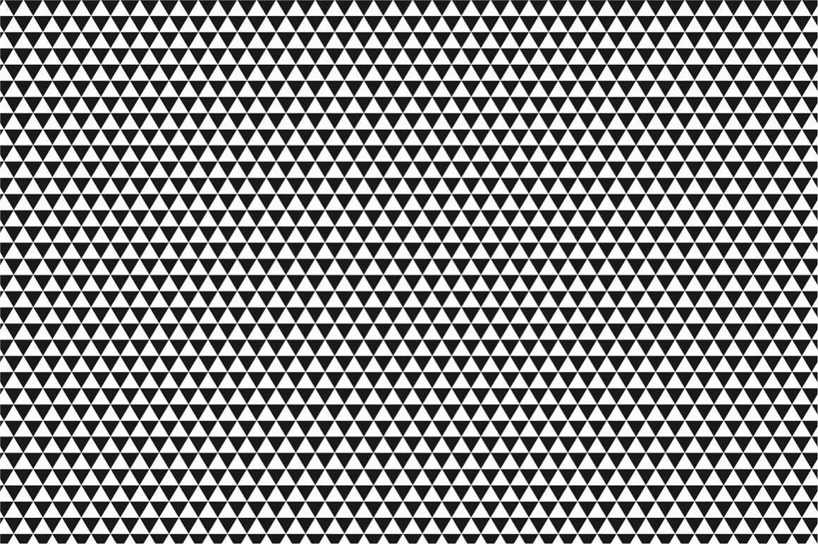 Triangular black and white seamless geometric pattern.