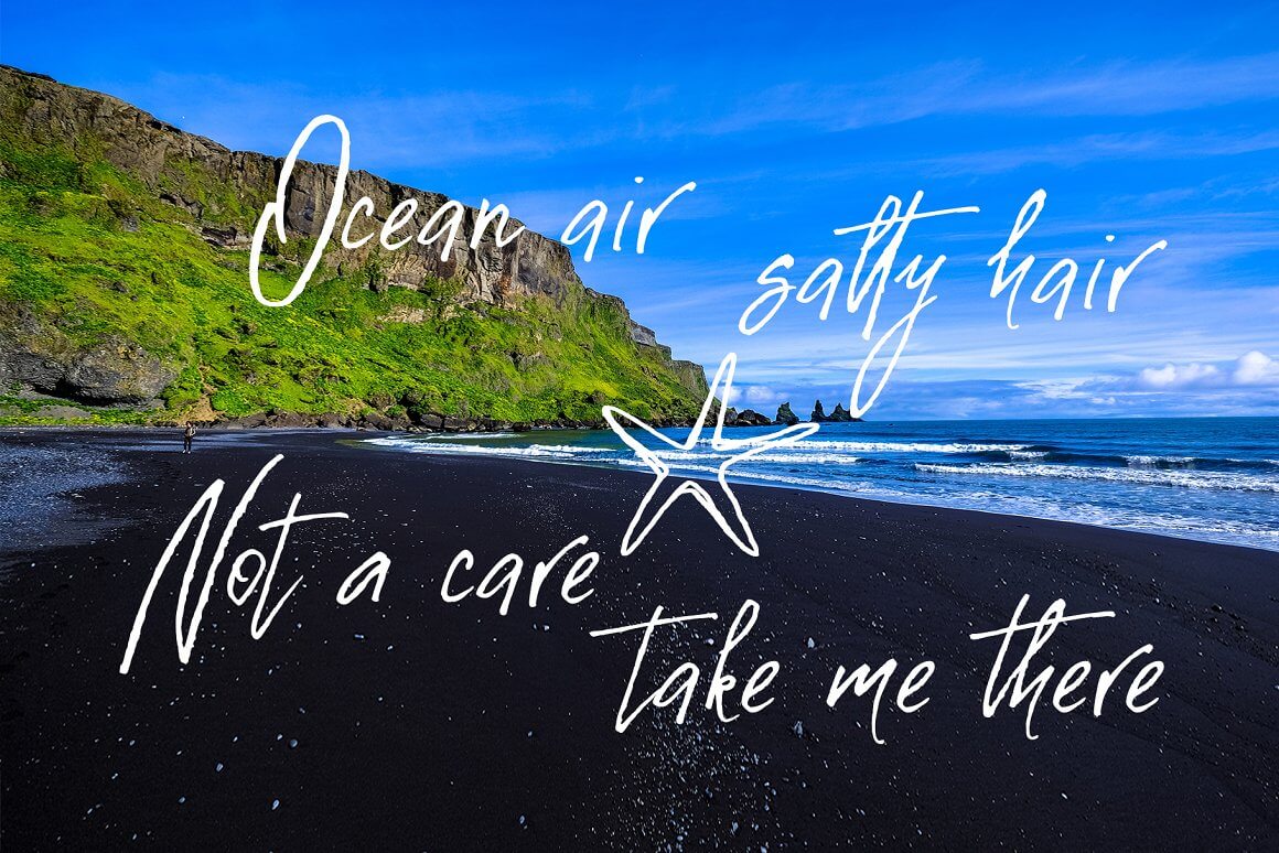 Beautiful sea view, inscription: Ocean air salty hair Not a care take me there.