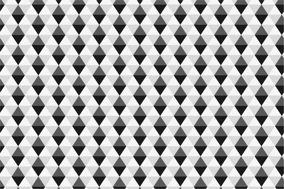 Seamless geometric pattern in the form of black, white and gray rhombuses.