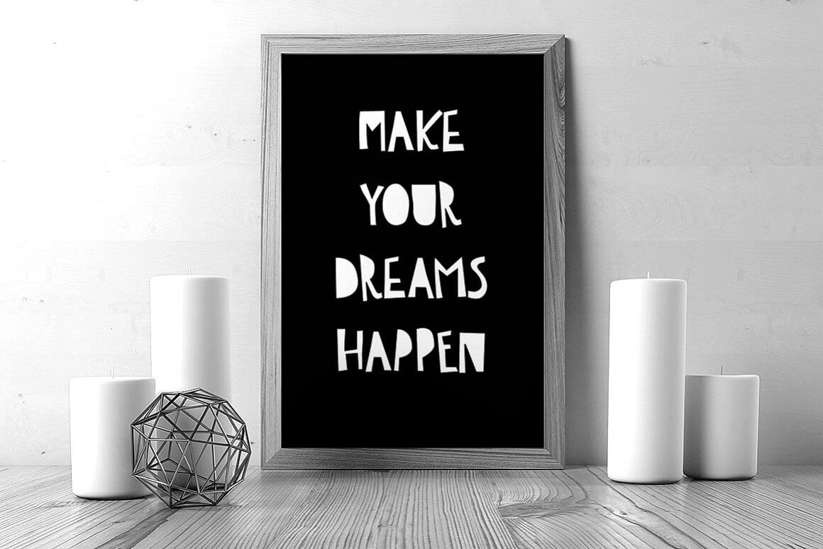 The inscription on the black painting: Make your dreams happen.