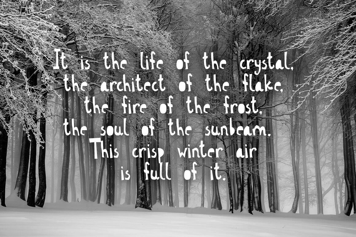 The inscription on the background of the winter forest: It is the life of the crystal.