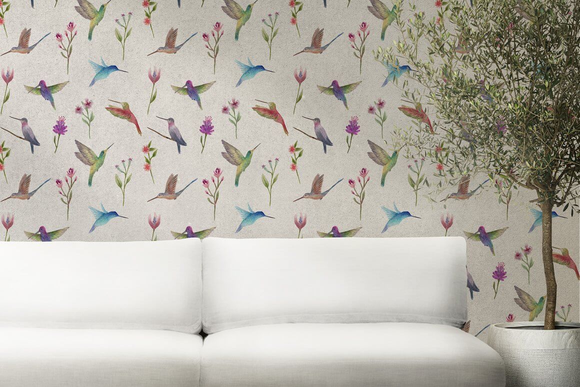 Wallpaper with painted watercolor hummingbirds and flowers.