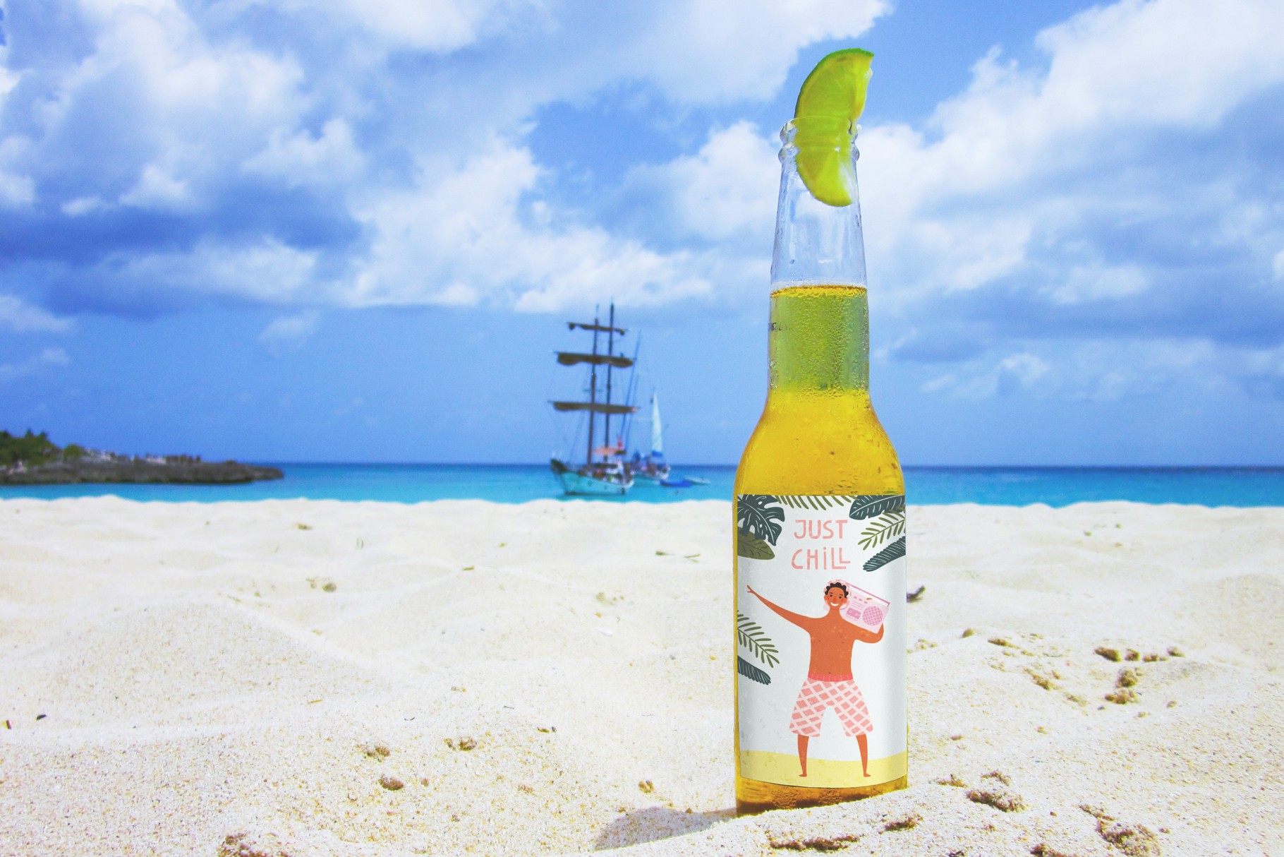 Print on a bottle on a background of the sea and a sailboat.