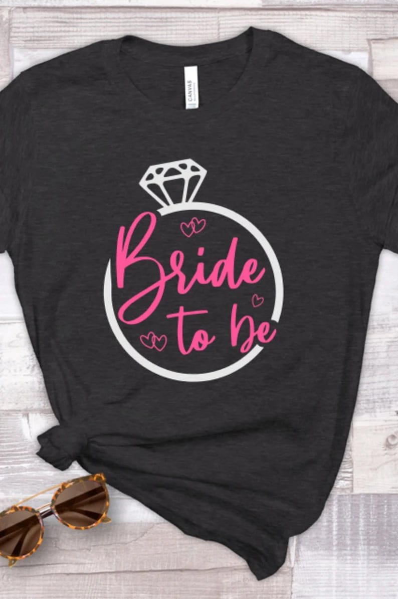 bride to be svg png, pink design on dark t-shirt mockup.