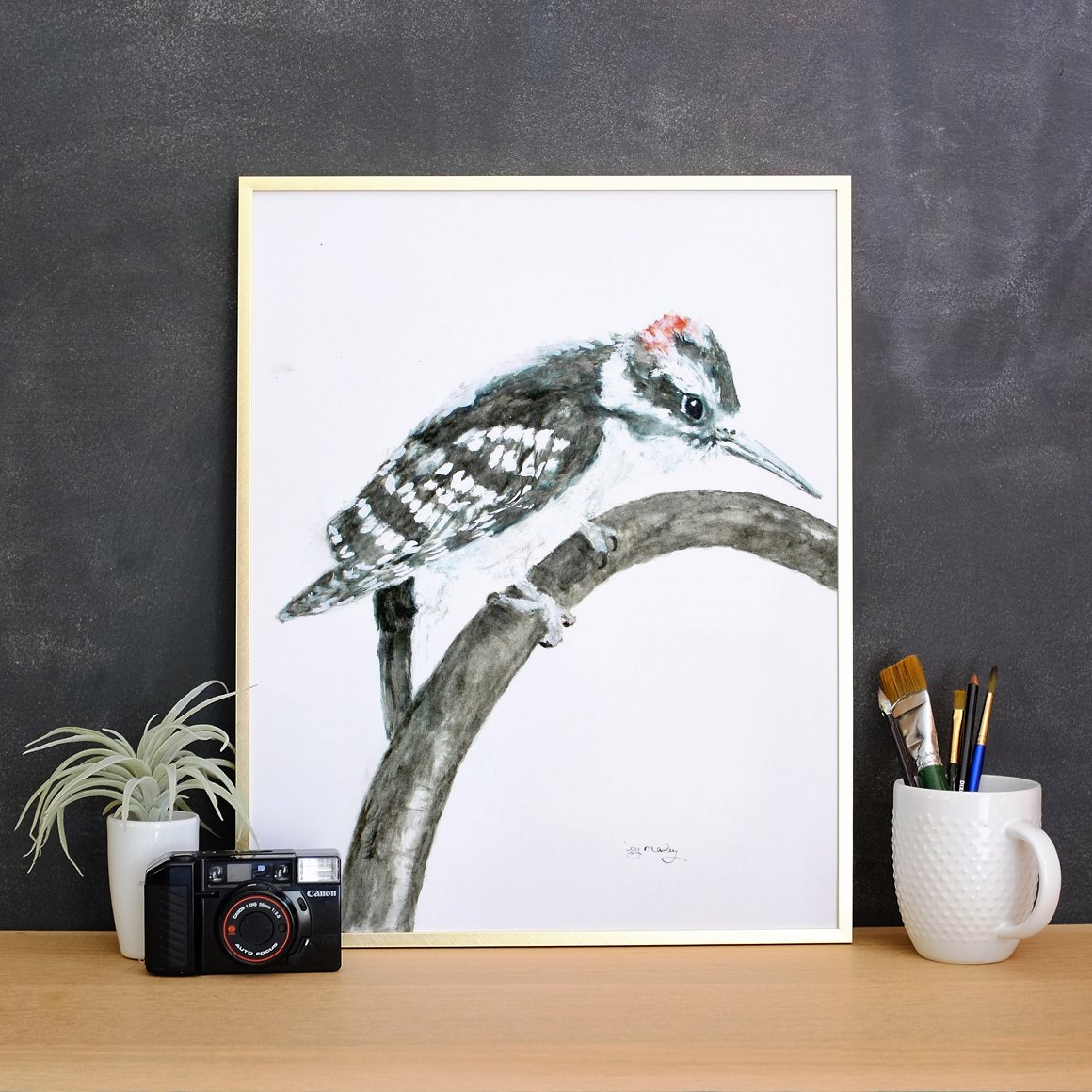 Picture of a woodpecker on canvas.