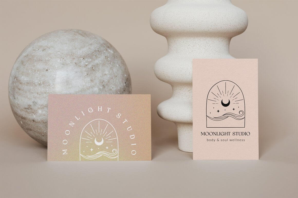Powder colored cards with inscriptions Moonlight studio and moonlight studio body and soul wellness.