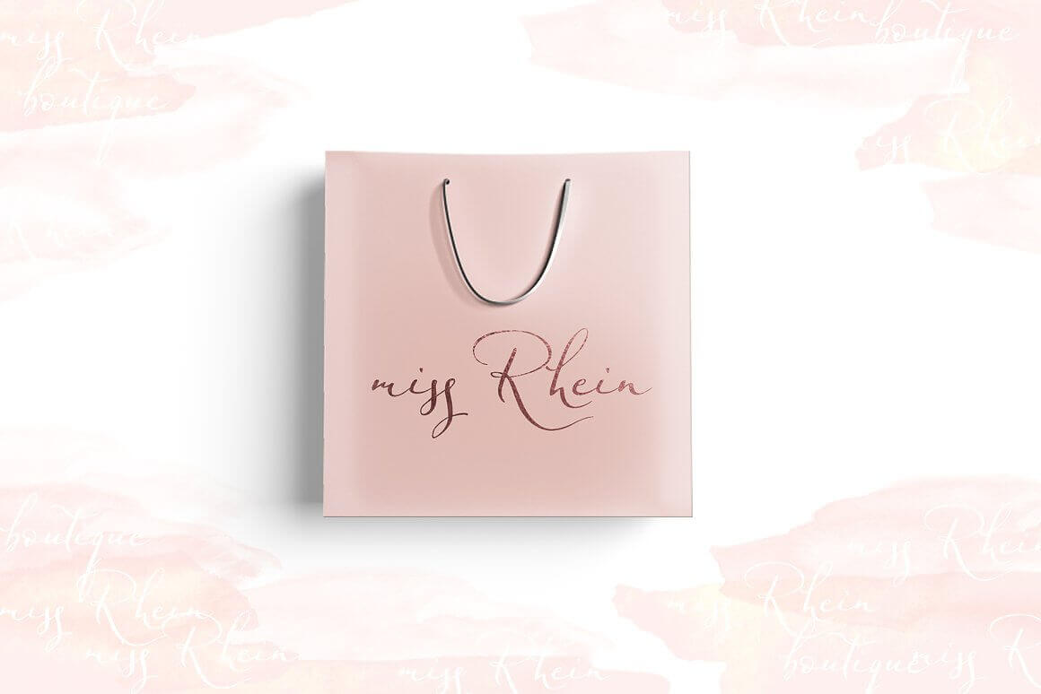 Pink cardboard bag labeled Miss Rhein.