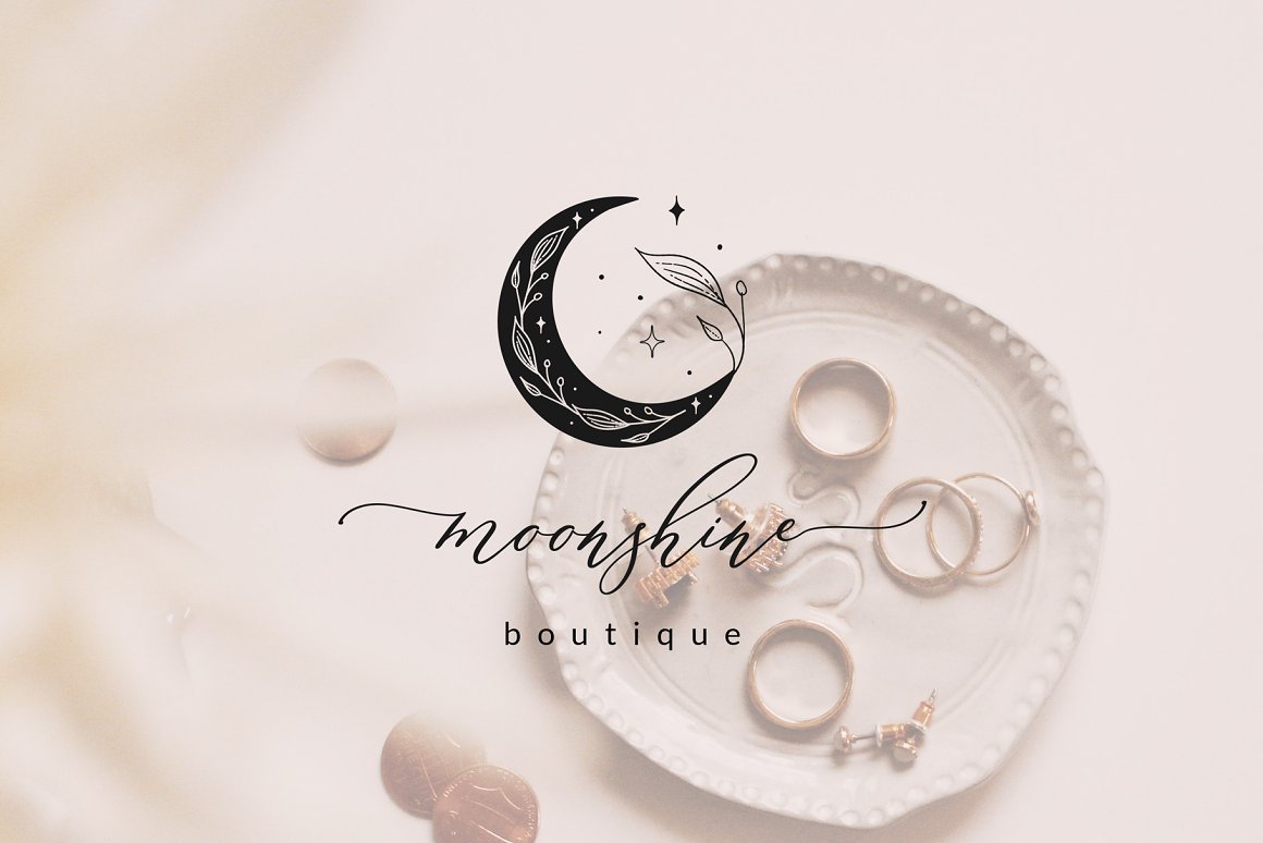 A logo with a moon decorated with plants and an inscription on a background with a plate of jewels.