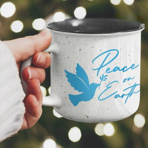 A unique blue dove princess on a metal mug.