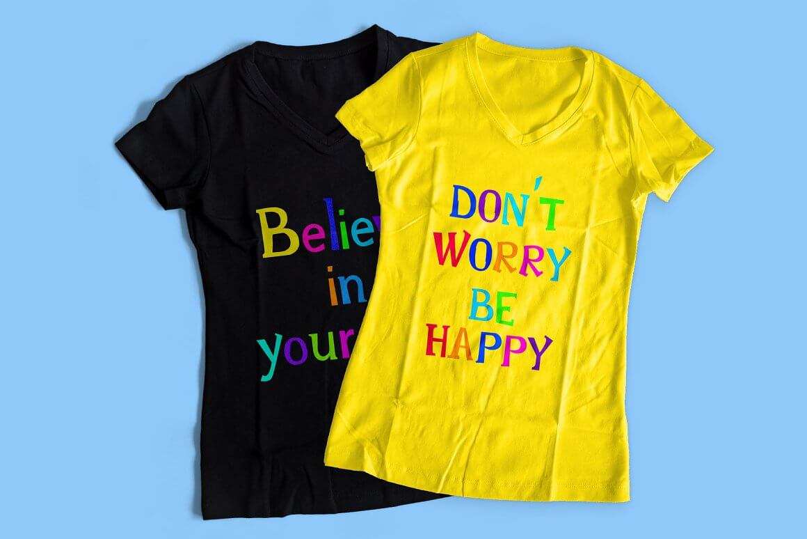 Black and yellow T-shirts with happy slogans.