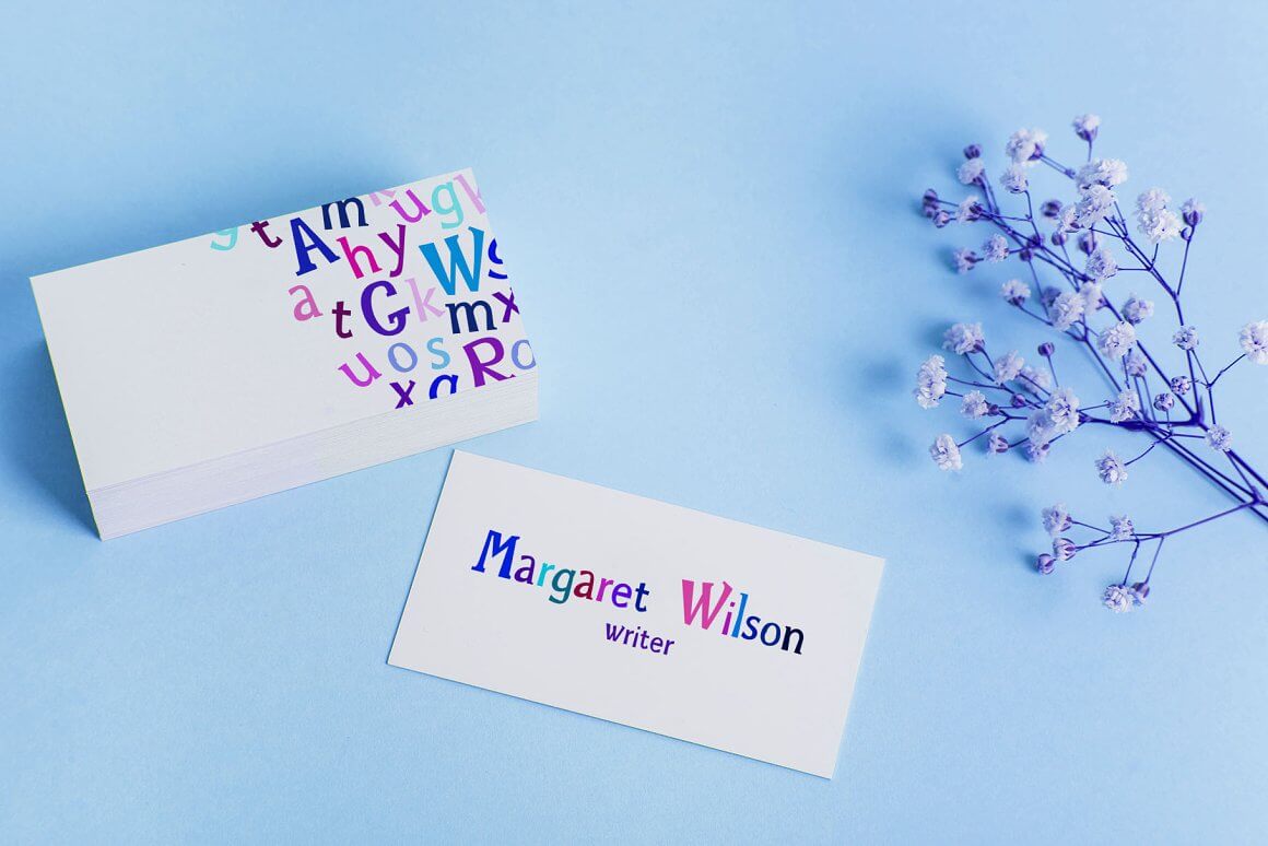 Cards "Margaret Wilson, writer" on the blue background.