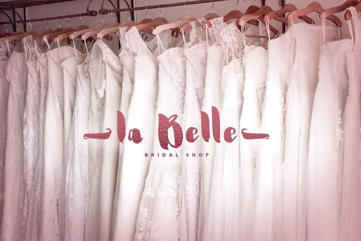Image of many wedding dresses "La Belle" bridal shop.