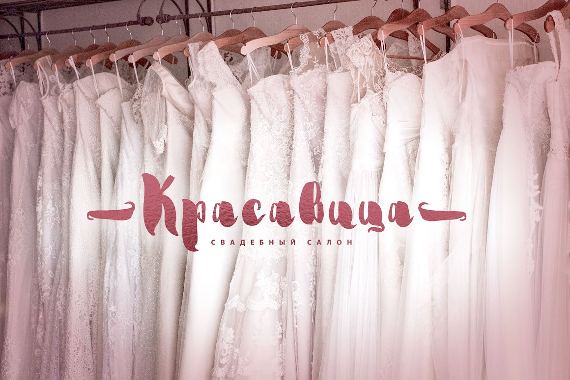 Image of many white wedding dresses of bridal shop.