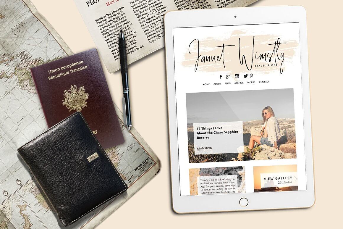 An image of tablet with travel blog, passport, pen and world map.