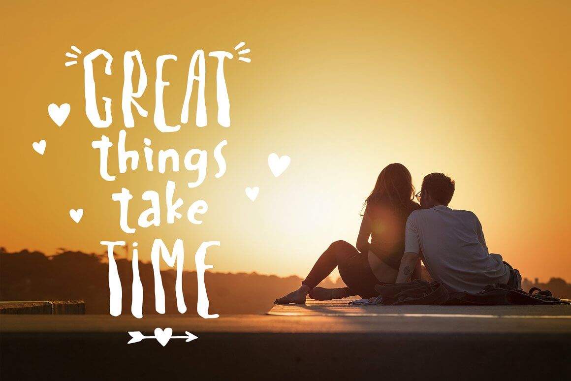 Silhouette of a couple in love at sunset with the inscription "Great things take time" written in Spaghetti font.