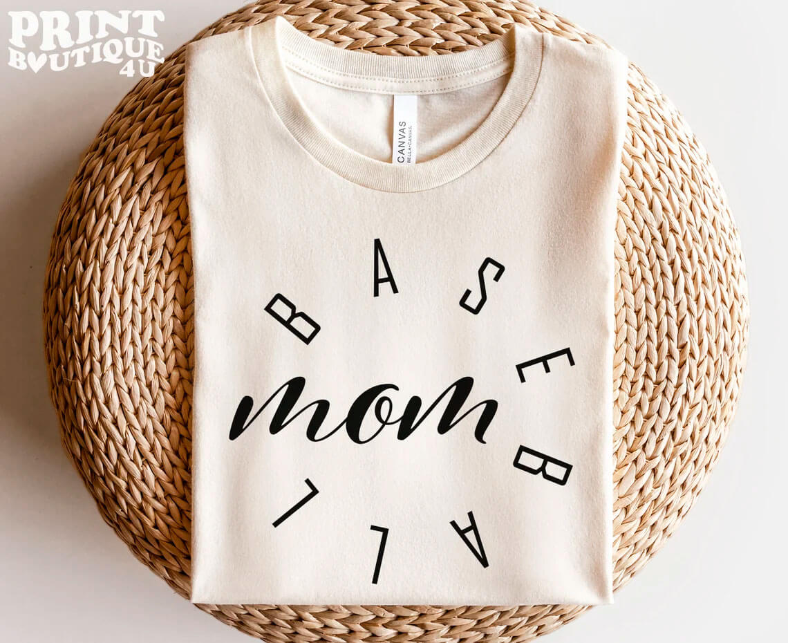 Beige t-shirt with baseball mom logo.